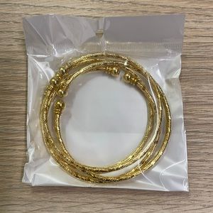 Lot of 4 gold color bracelets New